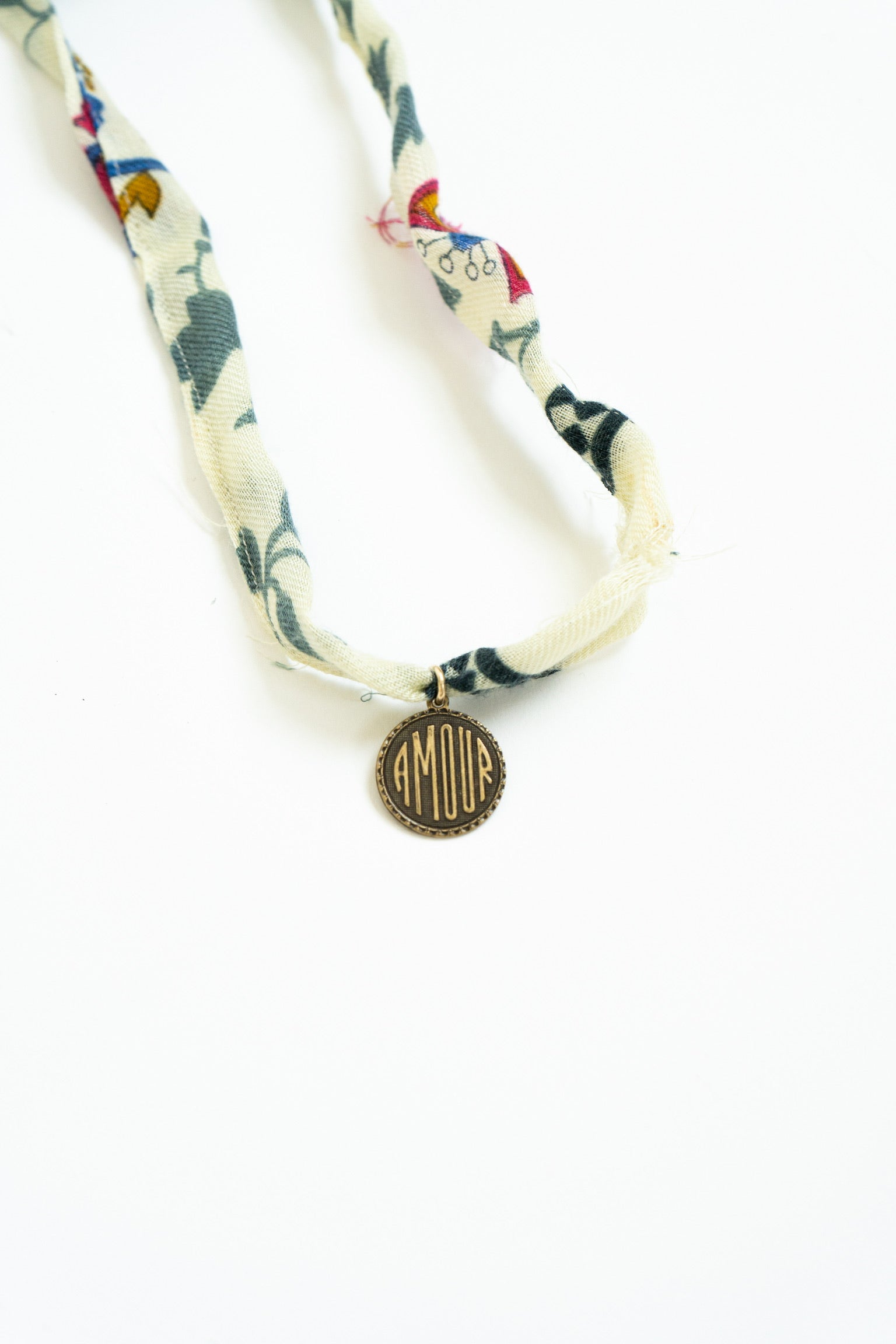 Clara Necklace with Vintage Amor Charm